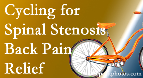 Aurora Chiropractic Center encourages exercise like cycling for back pain relief from lumbar spine stenosis.