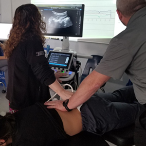picture Juneau chiropractic ultrasound imaging of spinal vertebrae during treatment